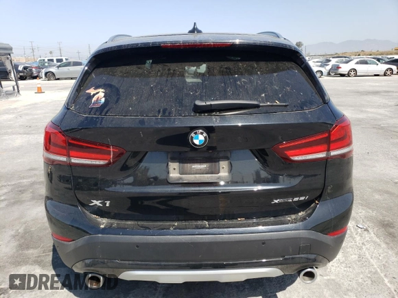 2020 BMW X1 xDrive28i with VIN WBXJG9C04L5P80773, listed as a Copart auction lot 49285903 with 32,699 mi miles and . Bid and sale history available at DreamBid. Image 6.