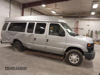 2014 Ford Econoline Wagon XL with VIN 1FBSS3BL1EDA11623, listed as a IAAI auction lot 41812934 with 1 mi miles. Bid and sale history available at carsss.com. Image 1.