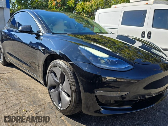 2021 Tesla Model 3 Standard Range Plus with VIN 5YJ3E1EA1MF871146, listed as a Copart auction lot 55633575 with 72,492 mi miles and Salvage Title. Bid and sale history available at DreamBid. Image 1.