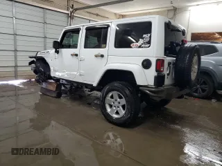 2017 Jeep Wrangler Unlimited Rubicon Recon with VIN 1C4HJWFG9HL543266, listed as a Copart auction lot 87771705 with 50,223 mi miles and Salvage title. Bid and sale history available at DreamBid. Image 2.