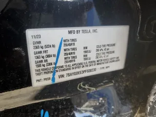 2023 Tesla Model Y Long Range with VIN 7SAYGDEE3PF938230, listed as a Copart auction lot 47883385 with 28,461 mi miles and Salvage Title. Bid and sale history available at carsss.com. Image 15.