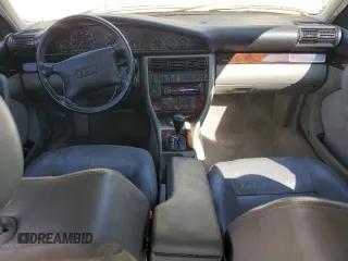 1996 Audi A6 z VIN WAUFA84A9TN007235, wystawiony jako Copart lot #78278774 z przebiegiem 148 857 mil mil oraz Tytuł czysty. Historia ofert i sprzedaży dostępna na DreamBid. Obrazek 8.