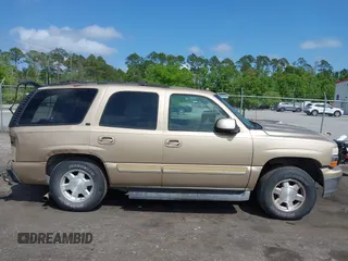 2005 Chevrolet Tahoe LT z VIN 1GNEC13T05J164155, wystawiony jako IAAI lot #42015852 z przebiegiem 216 683 mil mil oraz . Historia ofert i sprzedaży dostępna na DreamBid. Obrazek 13.