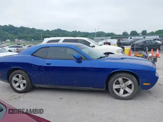 2012 Dodge Challenger SXT Plus z VIN 2C3CDYAG9CH239160, wystawiony jako IAAI lot #42198261 z przebiegiem 116 546 mil mil oraz . Historia ofert i sprzedaży dostępna na DreamBid. Obrazek 13.