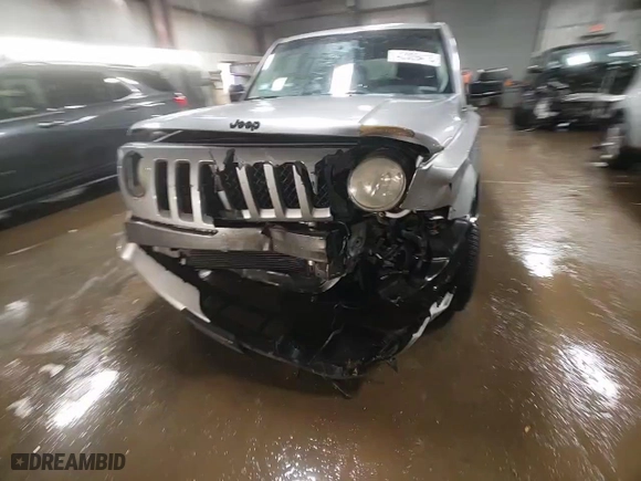 2015 Jeep Patriot Altitude Edition with VIN 1C4NJPBAXFD264877, listed as a Copart auction lot 42009415 with 99,371 mi miles and Salvage Title. Bid and sale history available at carsss.com. Image 13.