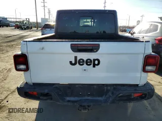 2023 Jeep Gladiator Sport S with VIN 1C6HJTAG4PL528847, listed as a Copart auction lot 64470375 with 36,177 mi miles and Salvage title. Bid and sale history available at DreamBid. Image 6.