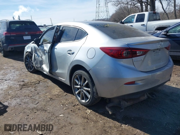 2018 Mazda 3 Touring z VIN 3MZBN1V36JM205904, wystawiony jako IAAI lot #41586707 z przebiegiem 145 401 mil mil oraz . Historia ofert i sprzedaży dostępna na DreamBid. Obrazek 3.