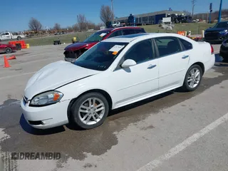 2014 Chevrolet Impala LTZ with VIN 2G1WC5E36E1182793, listed as a IAAI auction lot 41817899 with 171,776 mi miles and . Bid and sale history available at DreamBid. Image 19.