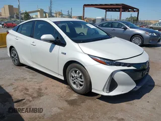 2017 Toyota Prius Plus z VIN JTDKARFP4H3002276, wystawiony jako IAAI lot #42466765 z przebiegiem 82 870 mil mil oraz . Historia ofert i sprzedaży dostępna na DreamBid. Obrazek 1.