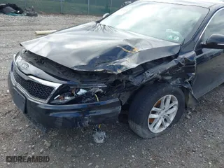 2012 Kia Optima LX with VIN 5XXGM4A7XCG017199, listed as a IAAI auction lot 41811678 with 168,691 mi miles. Bid and sale history available at carsss.com. Image 6.