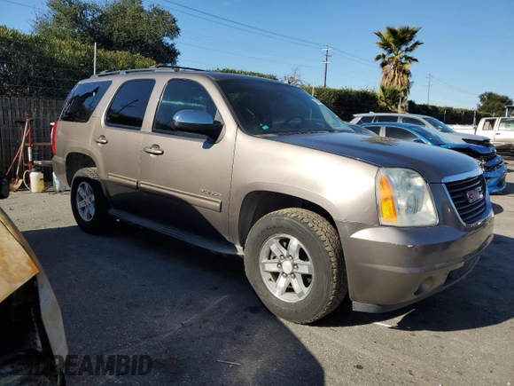 2012 GMC Yukon SLT with VIN 1GKS1CE03CR137258, listed as a Copart auction lot 87684815 with 253,348 mi miles and Salvage Title. Bid and sale history available at carsss.com. Image 4.