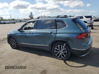 2021 Volkswagen Tiguan SE z VIN 3VV3B7AX6MM041166, wystawiony jako Copart lot #57769445 z przebiegiem 51 030 mil mil oraz Nie do naprawy • Non repairable. Historia ofert i sprzedaży dostępna na DreamBid. Obrazek 2.