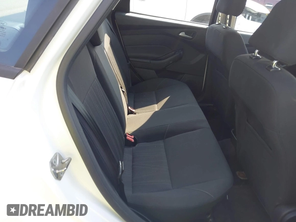 2016 Ford Focus SE with VIN 1FADP3F26GL247657, listed as a IAAI auction lot 42590097 with 37,851 mi miles and . Bid and sale history available at DreamBid. Image 8.