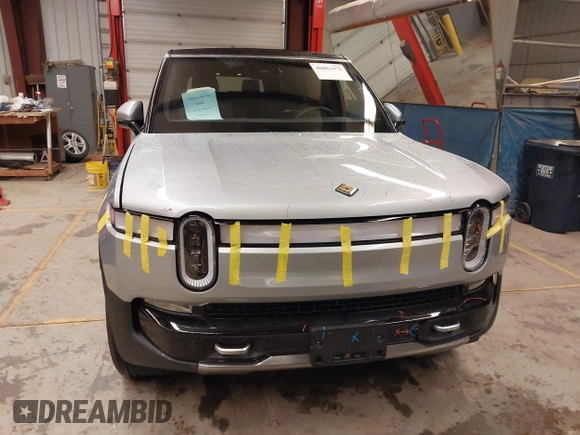 2024 Rivian R1S Adventure with VIN 7PDSGABA9RN039601, listed as a IAAI auction lot 40862472 with 6,186 mi miles. Bid and sale history available at carsss.com. Image 6.