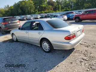 2002 Mercedes-Benz E-Class with VIN WDBJF82J42X077731, listed as a Copart auction lot 70280584 with 169,018 mi miles and Salvage Title. Bid and sale history available at carsss.com. Image 2.