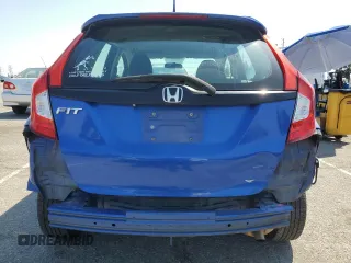 2015 Honda Fit LX with VIN 3HGGK5H53FM718378, listed as a Copart auction lot 52035245 with 104,786 mi miles and Salvage Title. Bid and sale history available at carsss.com. Image 6.