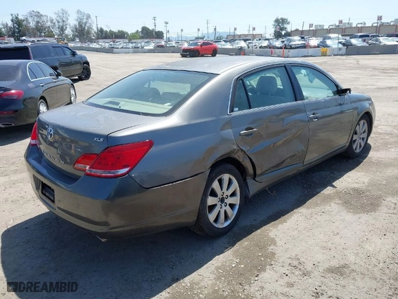 2005 Toyota Avalon XL with VIN 4T1BK36B75U041637, listed as a IAAI auction lot 41967868 with 157,582 mi miles. Bid and sale history available at carsss.com. Image 4.