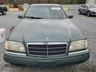 1995 Mercedes-Benz C 230/260/280/320 with VIN WDBHA28E3SF241951, listed as a Copart auction lot 50332845 with 236,068 mi miles and Salvage title. Bid and sale history available at DreamBid. Image 5.