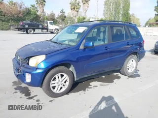 2003 Toyota RAV4 with VIN JTEGH20V630113868, listed as a IAAI auction lot 42091639 with 167,781 mi miles. Bid and sale history available at carsss.com. Image 2.