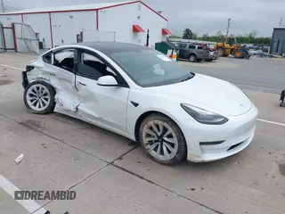 2023 Tesla Model 3 with VIN 5YJ3E1EA3PF563240, listed as a IAAI auction lot 42190104 with 32,596 mi miles and . Bid and sale history available at DreamBid. Image 1.