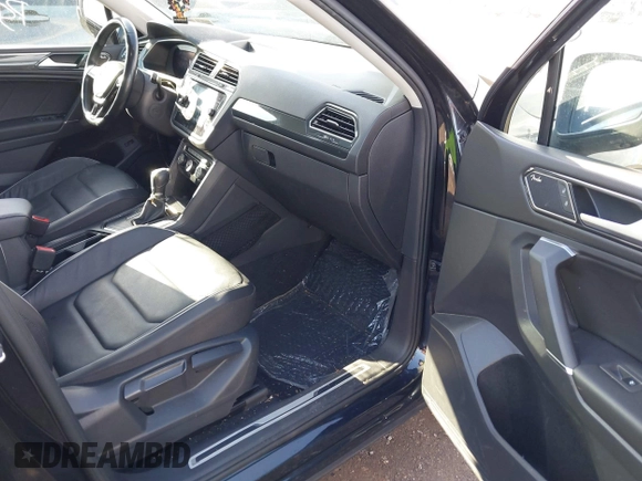 2018 Volkswagen Tiguan SEL Premium with VIN 3VV5B7AX8JM073475, listed as a IAAI auction lot 41816194 with 65,838 mi miles and . Bid and sale history available at DreamBid. Image 5.