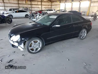 2007 Mercedes-Benz CLK 550 z VIN WDBTJ72H77F214284, wystawiony jako Copart lot #57358865 z przebiegiem 57 319 mil mil oraz Szkody całkowita. Historia ofert i sprzedaży dostępna na DreamBid. Obrazek 1.