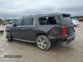 2015 Chevrolet Suburban LT with VIN 1GNSCJKC1FR159411, listed as a Copart auction lot 52169465 with 145,511 mi miles and Salvage title. Bid and sale history available at DreamBid. Image 2.