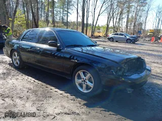 2003 Mercury Marauder with VIN 2MEHM75V33X628952, listed as a IAAI auction lot 41534323 with 92,228 mi miles. Bid and sale history available at carsss.com. Image 1.