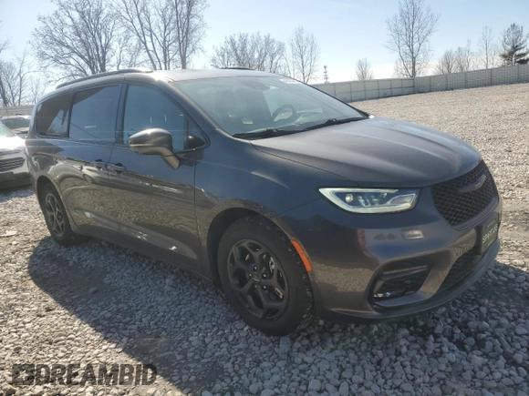 2021 Chrysler Pacifica Hybrid Touring L with VIN 2C4RC1L76MR526898, listed as a Copart auction lot 48133815 with 73,274 mi miles and Salvage title. Bid and sale history available at DreamBid. Image 4.