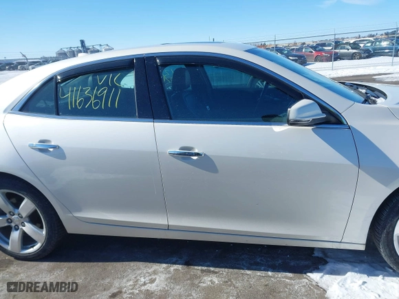 2014 Chevrolet Malibu LTZ with VIN 1G11J5SX5EF215539, listed as a IAAI auction lot 41636911 with 110,484 mi miles. Bid and sale history available at carsss.com. Image 13.