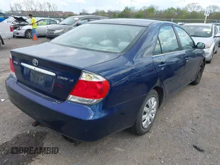 2006 Toyota Camry STD with VIN 4T1BE32K66U156633, listed as a IAAI auction lot 42017984 with 167,321 mi miles. Bid and sale history available at carsss.com. Image 4.