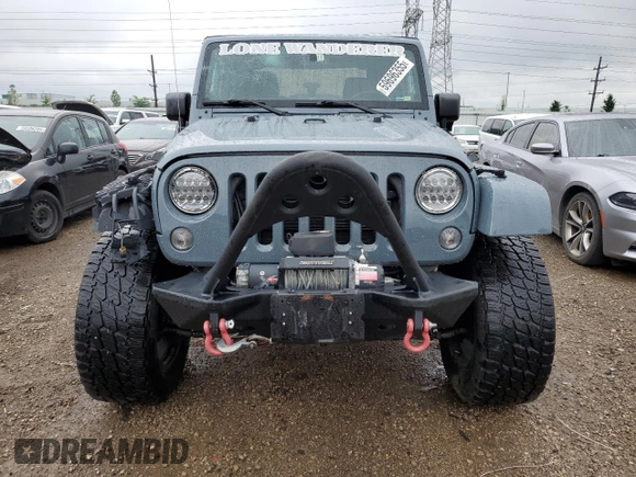 2014 Jeep Wrangler Sport с VIN 1C4AJWAG1EL117219, выставлен на аукционе Copart как лот 59696355 с пробегом 105 865 миль миль и Списание • Salvage title. История ставок и продаж доступна на DreamBid. Изображение 5.