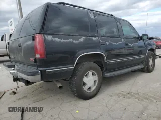 1999 GMC Yukon with VIN 1GKEK13R9XJ803351, listed as a Copart auction lot 81800974 with 0 mi miles and Salvage Title. Bid and sale history available at carsss.com. Image 3.