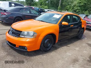 2014 Dodge Avenger SXT with VIN 1C3CDZCB7EN237635, listed as a IAAI auction lot 42521196 with 126,879 mi miles and . Bid and sale history available at DreamBid. Image 17.