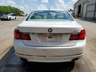 2014 BMW 7 Series 740i z VIN WBAYA6C51ED144132, wystawiony jako Copart lot #55131365 z przebiegiem 116 826 mil mil oraz Szkoda całkowita • Salvage title. Historia ofert i sprzedaży dostępna na DreamBid. Obrazek 6.