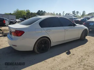 2015 BMW 3 Series 328i with VIN WBA3A5G53FNS83611, listed as a Copart auction lot 52117425 with 164,675 mi miles and Salvage Title. Bid and sale history available at carsss.com. Image 3.