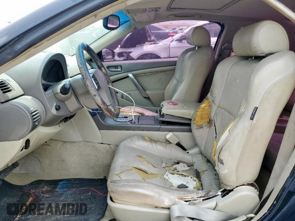 2004 Infiniti G35 w/Leather z VIN JNKCV54E34M826310, wystawiony jako Copart lot #59636735 z przebiegiem 215 769 mil mil oraz Szkoda całkowita • Salvage title. Historia ofert i sprzedaży dostępna na DreamBid. Obrazek 7.