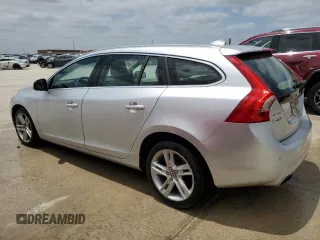 2015 Volvo V60 z VIN YV1612SC1F1191466, wystawiony jako Copart lot #64906184 z przebiegiem 89 444 mil mil oraz Szkoda całkowita • Salvage title. Historia ofert i sprzedaży dostępna na DreamBid. Obrazek 2.