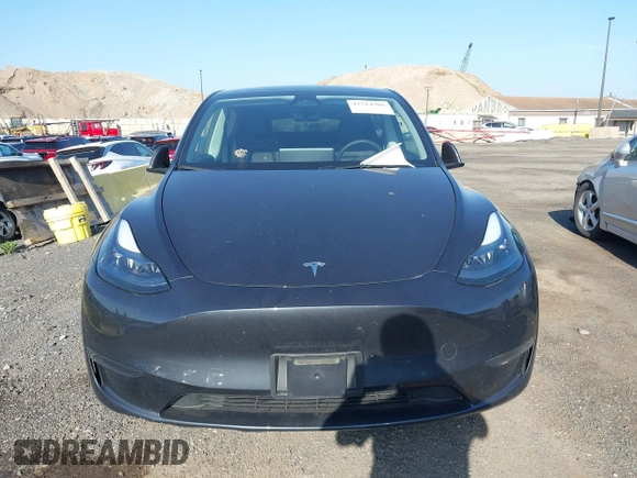 2024 Tesla Model Y z VIN 7SAYGDED8RF158878, wystawiony jako IAAI lot #42514586 z przebiegiem 18 594 mil mil oraz . Historia ofert i sprzedaży dostępna na DreamBid. Obrazek 12.