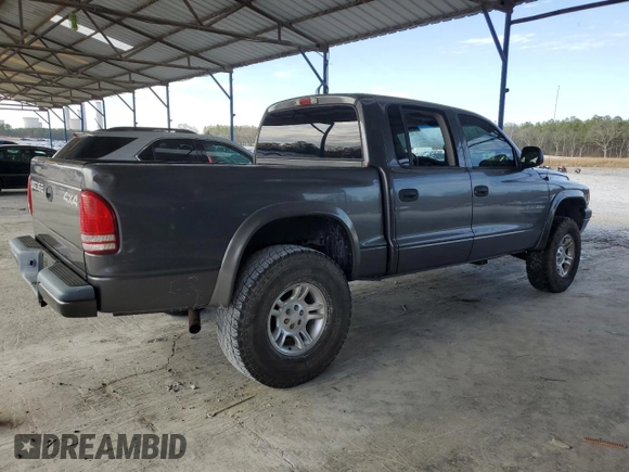 2002 Dodge Dakota Sport with VIN 1B7HG38N12S515919, listed as a Copart auction lot 42930835 with 180,701 mi miles and Salvage Title. Bid and sale history available at carsss.com. Image 3.