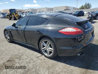 2012 Porsche Panamera z VIN WP0AA2A73CL071401, wystawiony jako Copart lot #49864355 z przebiegiem 95 142 mil mil oraz Czysty tytuł • Clean title. Historia ofert i sprzedaży dostępna na DreamBid. Obrazek 2.