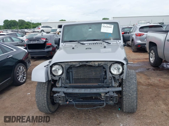 2016 Jeep Wrangler Unlimited Sahara z VIN 1C4BJWEGXGL280016, wystawiony jako IAAI lot #42620102 z przebiegiem 128 232 mil mil oraz . Historia ofert i sprzedaży dostępna na DreamBid. Obrazek 13.