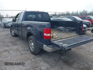 2005 Ford F-150 XLT with VIN 1FTPX12565NA61341, listed as a IAAI auction lot 41693609 with 401,988 mi miles. Bid and sale history available at carsss.com. Image 3.