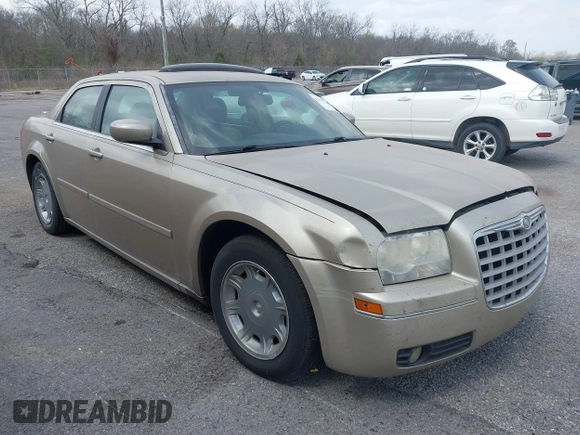 2006 Chrysler 300 Touring with VIN 2C3KA53G56H309497, listed as a IAAI auction lot 41792324 with 128,492 mi miles. Bid and sale history available at carsss.com. Image 1.