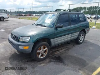 1999 Toyota RAV4 with VIN JT3GP10V4X7052720, listed as a IAAI auction lot 42490948 with 321,165 mi miles and . Bid and sale history available at DreamBid. Image 2.