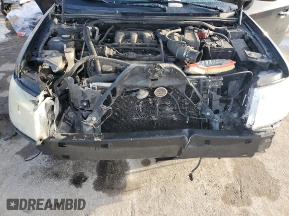 2008 Ford Taurus Limited with VIN 1FAHP25W38G181594, listed as a Copart auction lot 79701014 with 129,968 mi miles and Salvage Title. Bid and sale history available at carsss.com. Image 11.