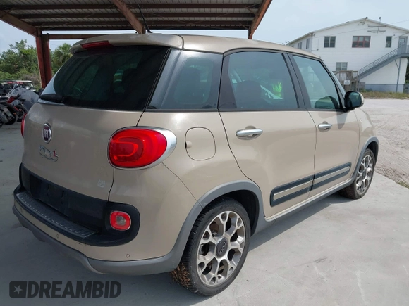 2014 FIAT 500L Trekking with VIN ZFBCFADH2EZ018037, listed as a IAAI auction lot 42196695 with 88,743 mi miles and . Bid and sale history available at DreamBid. Image 4.