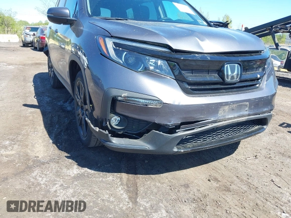 2021 Honda Pilot Special Edition z VIN 5FNYF6H27MB043638, wystawiony jako IAAI lot #42127878 z przebiegiem 50 401 mil mil oraz . Historia ofert i sprzedaży dostępna na DreamBid. Obrazek 6.