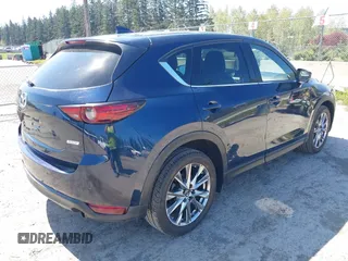 2019 Mazda CX-5 Signature with VIN JM3KFBEY7K0589236, listed as a IAAI auction lot 42078418 with 86,959 mi miles. Bid and sale history available at carsss.com. Image 4.