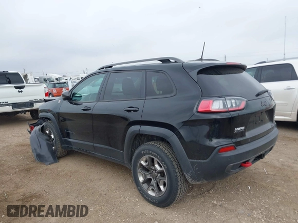 2019 Jeep Cherokee Trailhawk Elite with VIN 1C4PJMBX4KD385796, listed as a IAAI auction lot 41557577 with 55,700 mi miles. Bid and sale history available at carsss.com. Image 14.